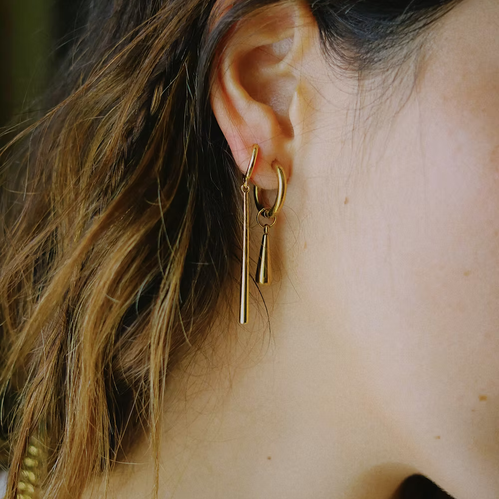 
                      
                        Margaux Lee - Droplet Hoops in Gold
                      
                    