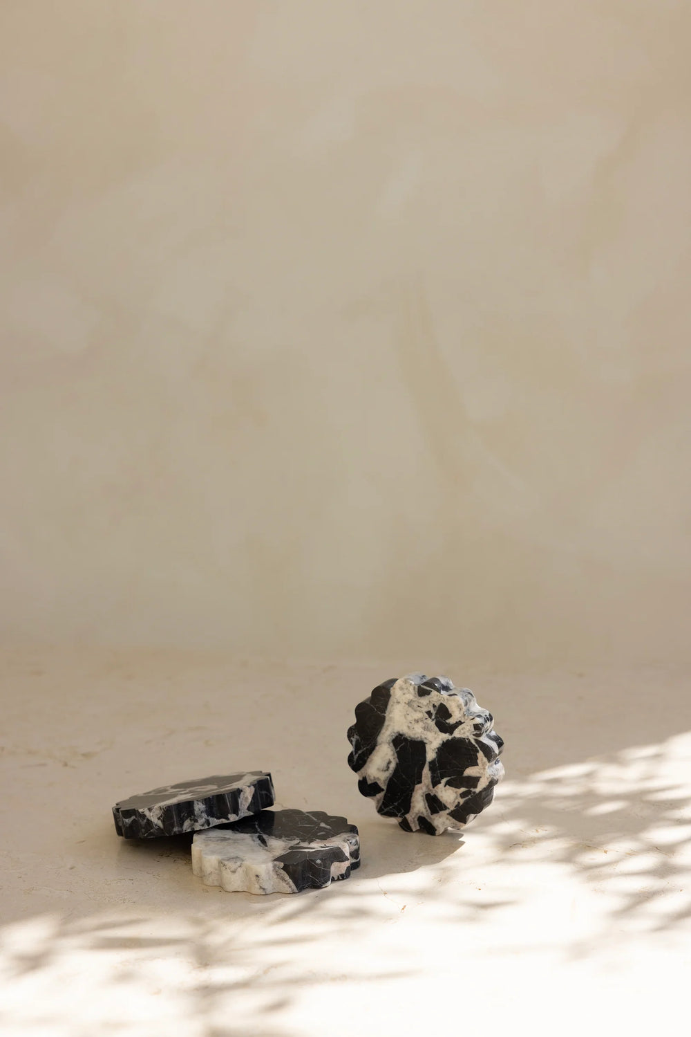 By West - Wave Coaster in Noir Grand Antique