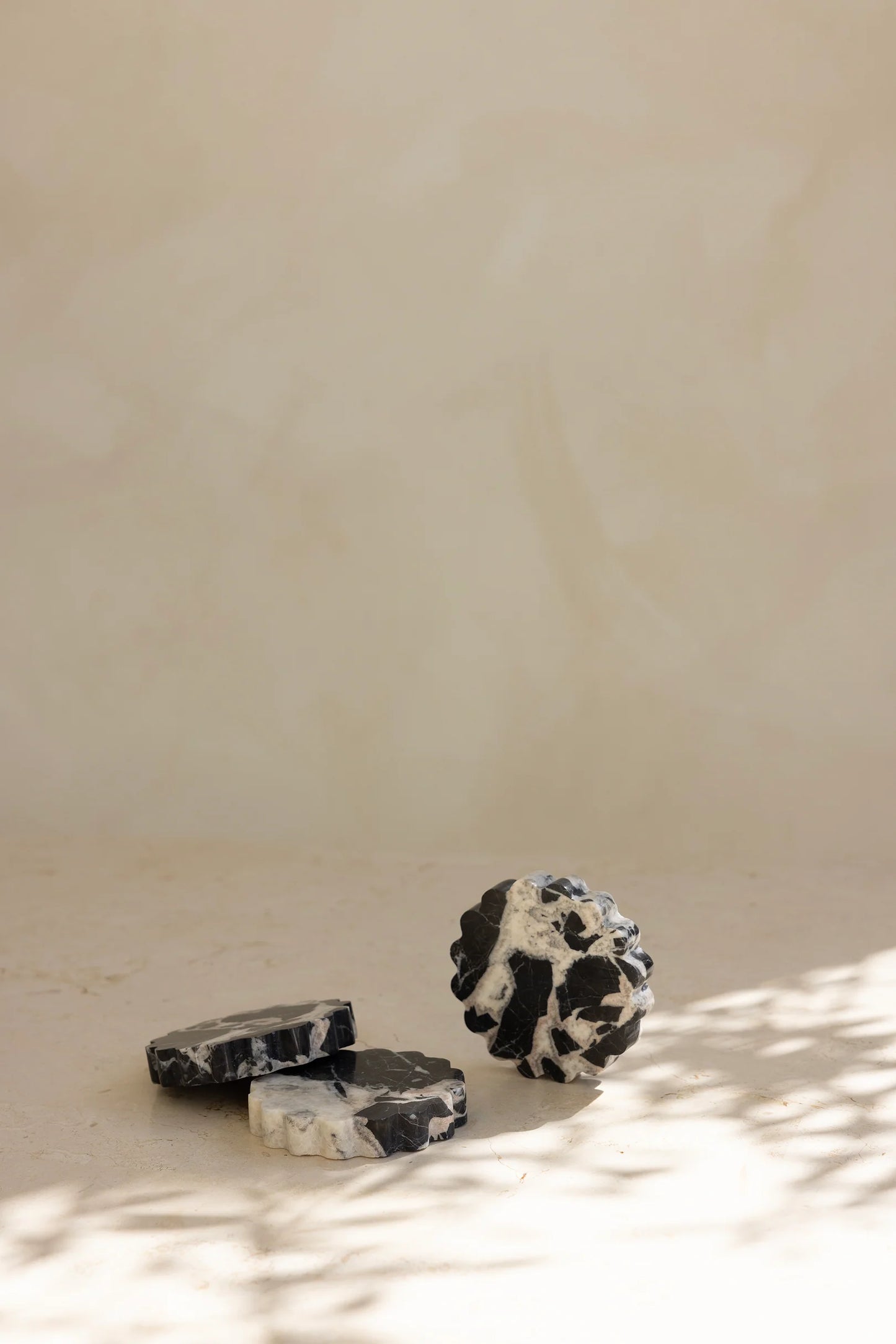 By West - Wave Coaster in Noir Grand Antique