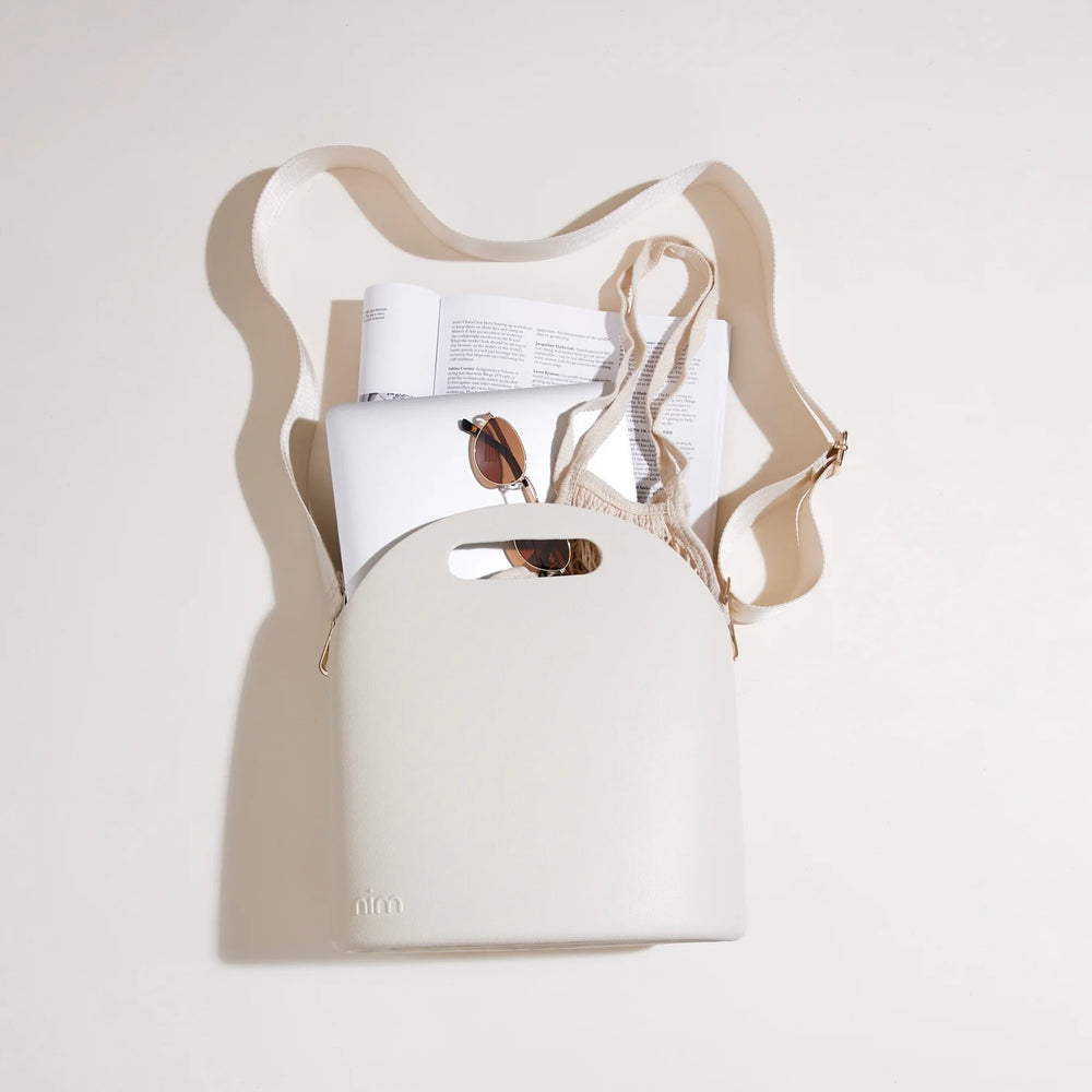 
                      
                        NIM The Label - BB Body Bag in Creme
                      
                    