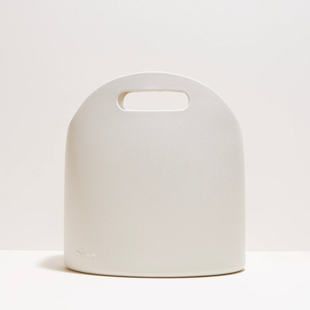 
                      
                        NIM The Label - BB Body Bag in Creme
                      
                    