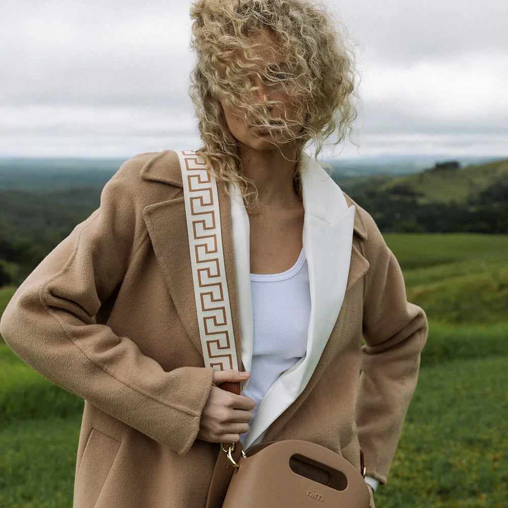 
                      
                        NIM The Label - Shoulder Strap in Creme/Latte Key
                      
                    