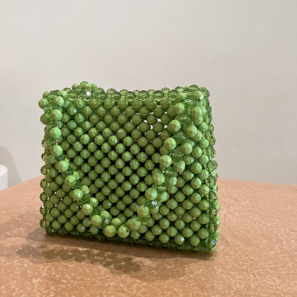 
                      
                        We Are Emte - Lola Beaded Bag in Candy Apple
                      
                    