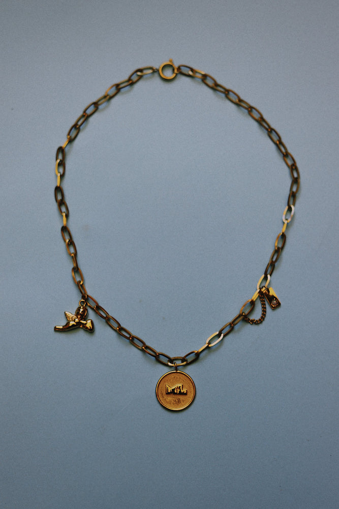 
                      
                        Margaux Lee - Travellers Charm Necklace in Gold
                      
                    