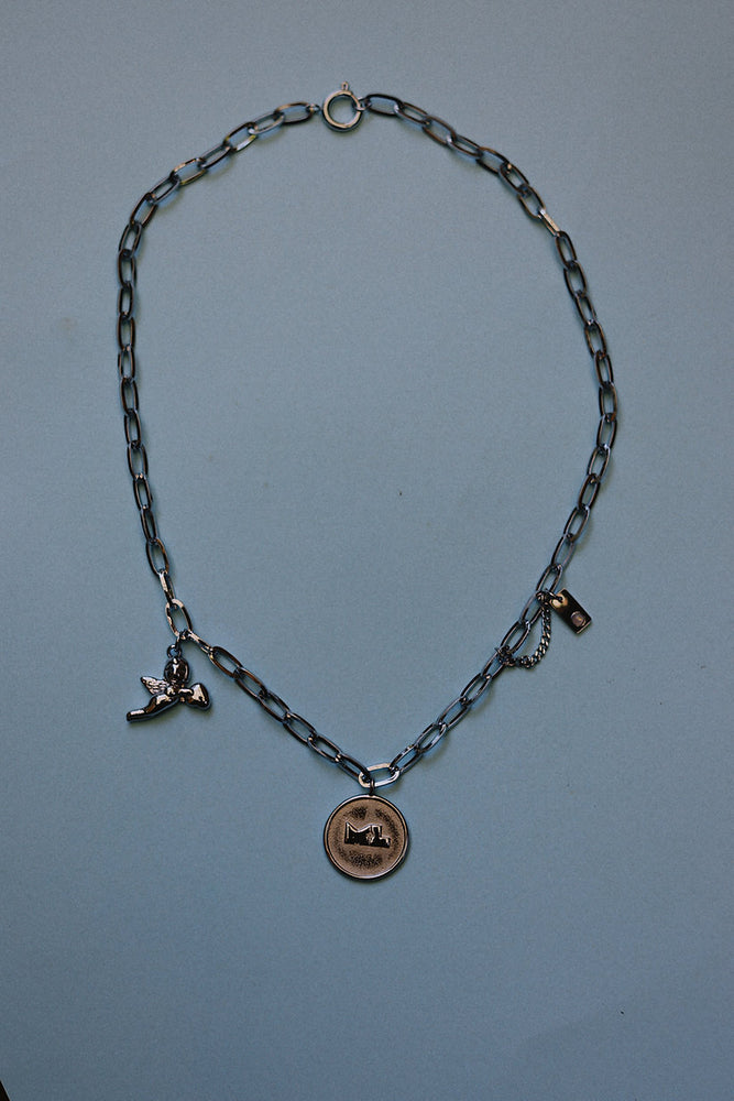 
                      
                        Margaux Lee - Travellers Charm Necklace in Silver
                      
                    