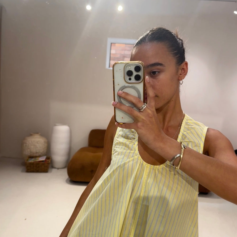 
                      
                        Emte - Poplin Dress in butter stripe
                      
                    