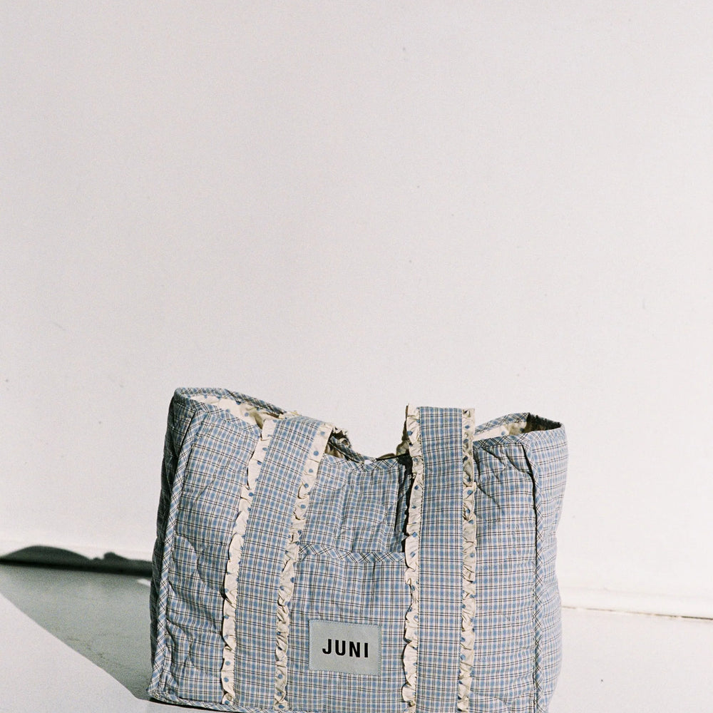
                      
                        JUNI - The Everything Bag in Blue Check
                      
                    