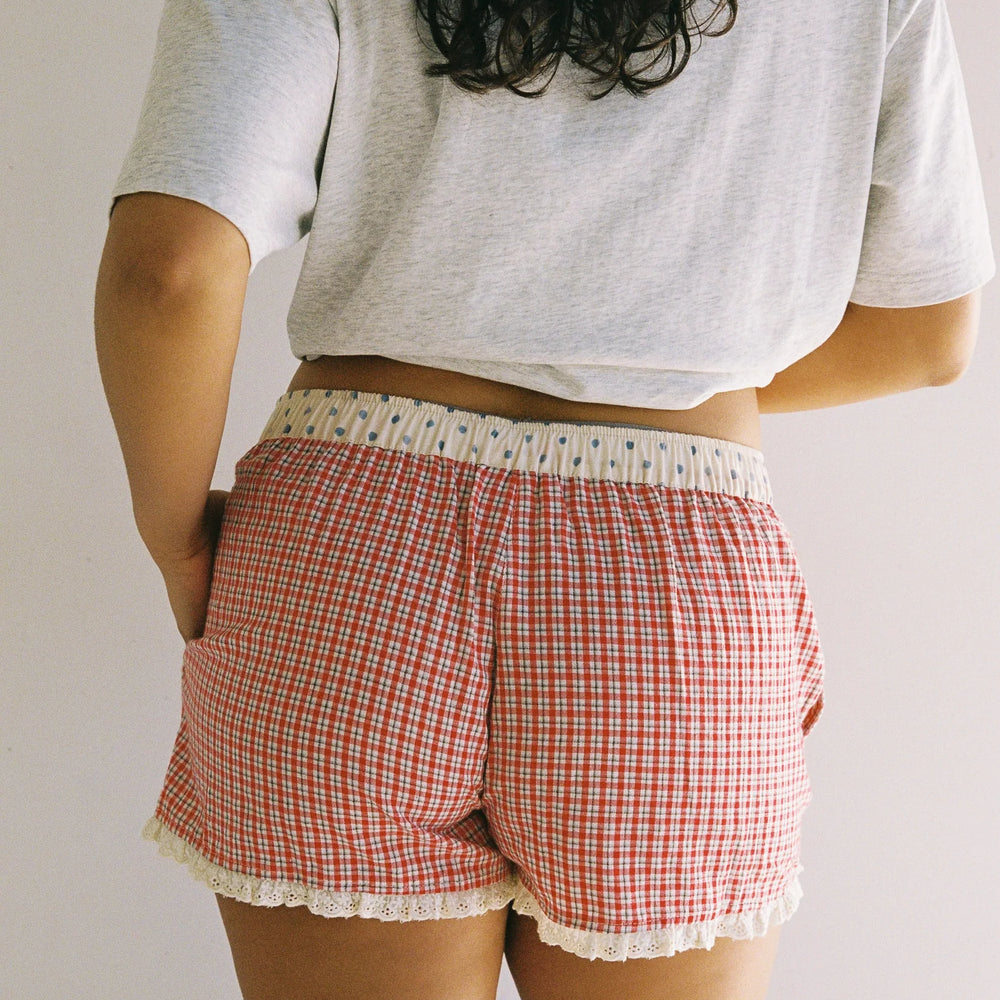 
                      
                        JUNI - Josie Boxer Short in Red Check
                      
                    