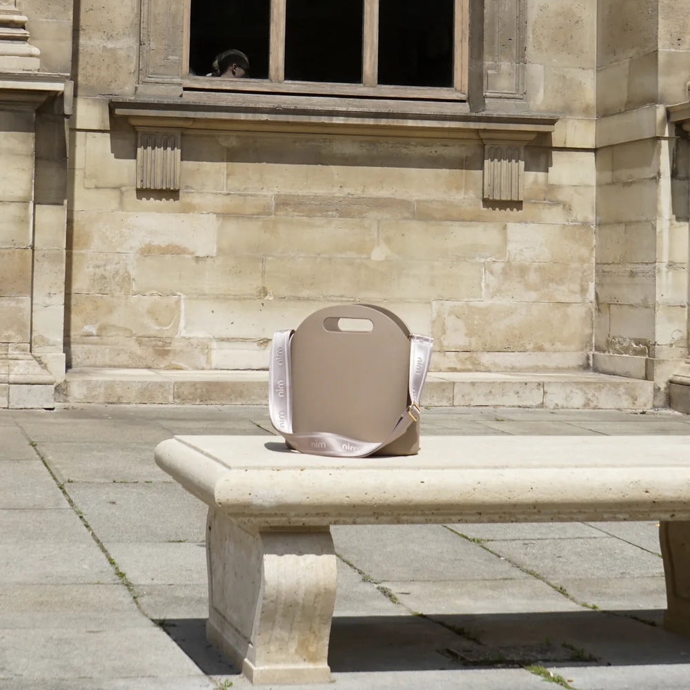 
                      
                        NIM The Label - BB Body Bag in Taupe
                      
                    