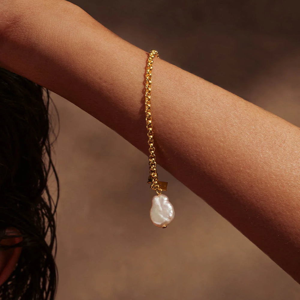 
                      
                        By Charlotte  - Embrace Stillness Pearl Bracelet in Gold
                      
                    