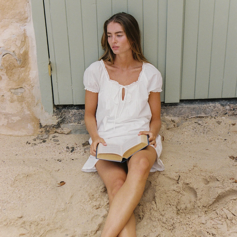 
                      
                        JUNI - Scout Mini Dress in Blanc
                      
                    