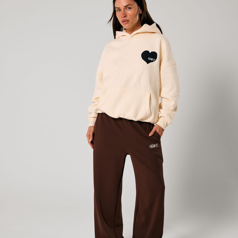 
                      
                        SSAINT - Heart Hoodie in Butter/ Black Heart
                      
                    