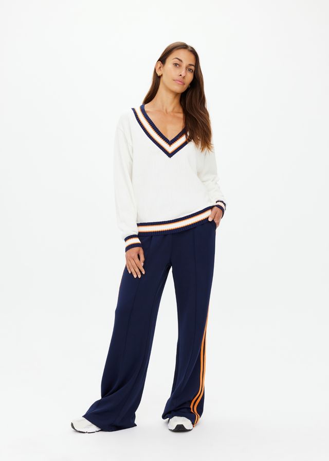 
                      
                        The Upside - Josette V Neck Knit Sweater in White
                      
                    
