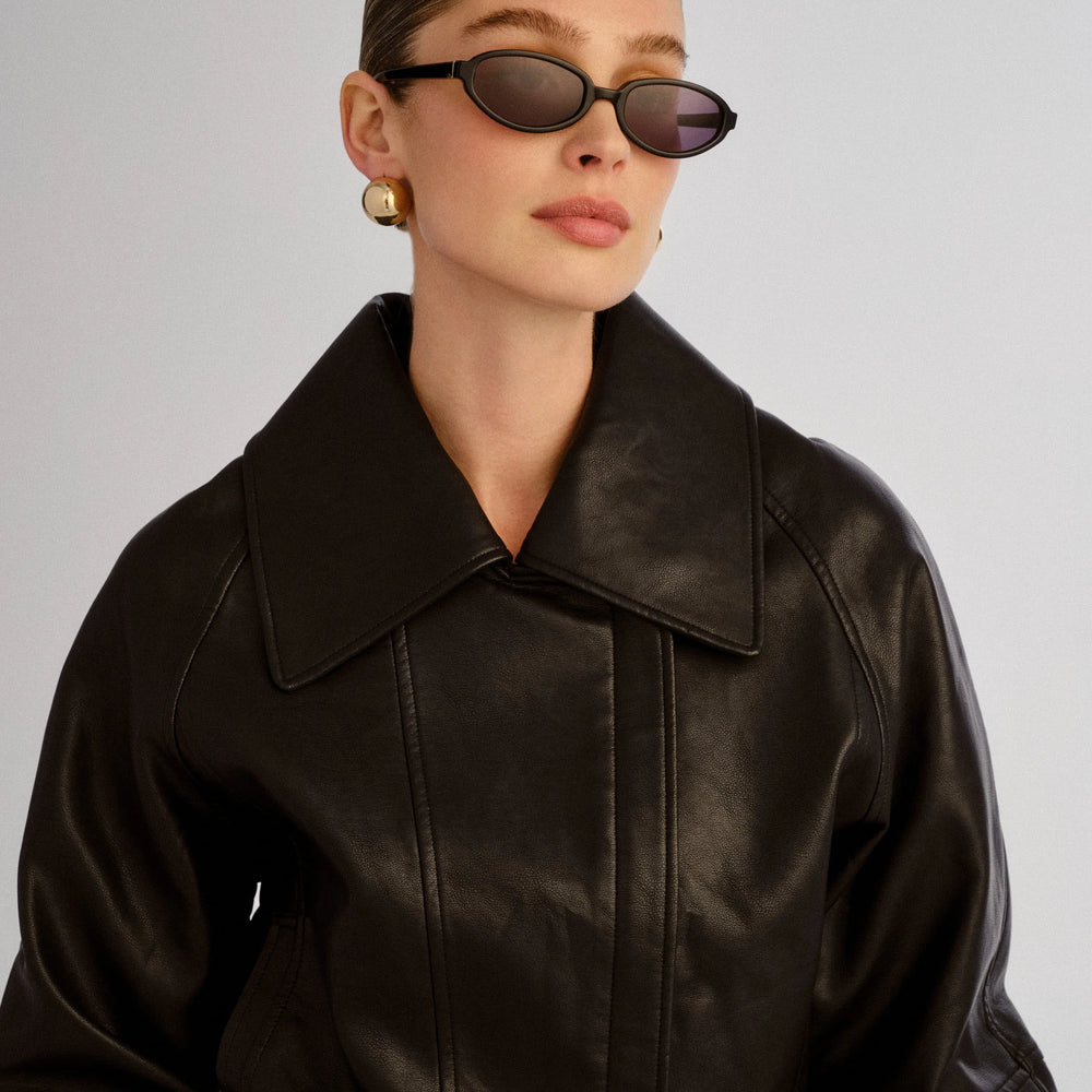
                      
                        LUV LOU - The Olive in Black
                      
                    
