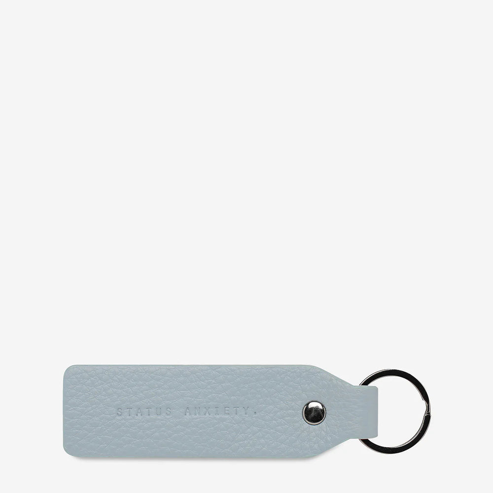 Status Anxiety - Make Your Move Keyring in Powder Blue