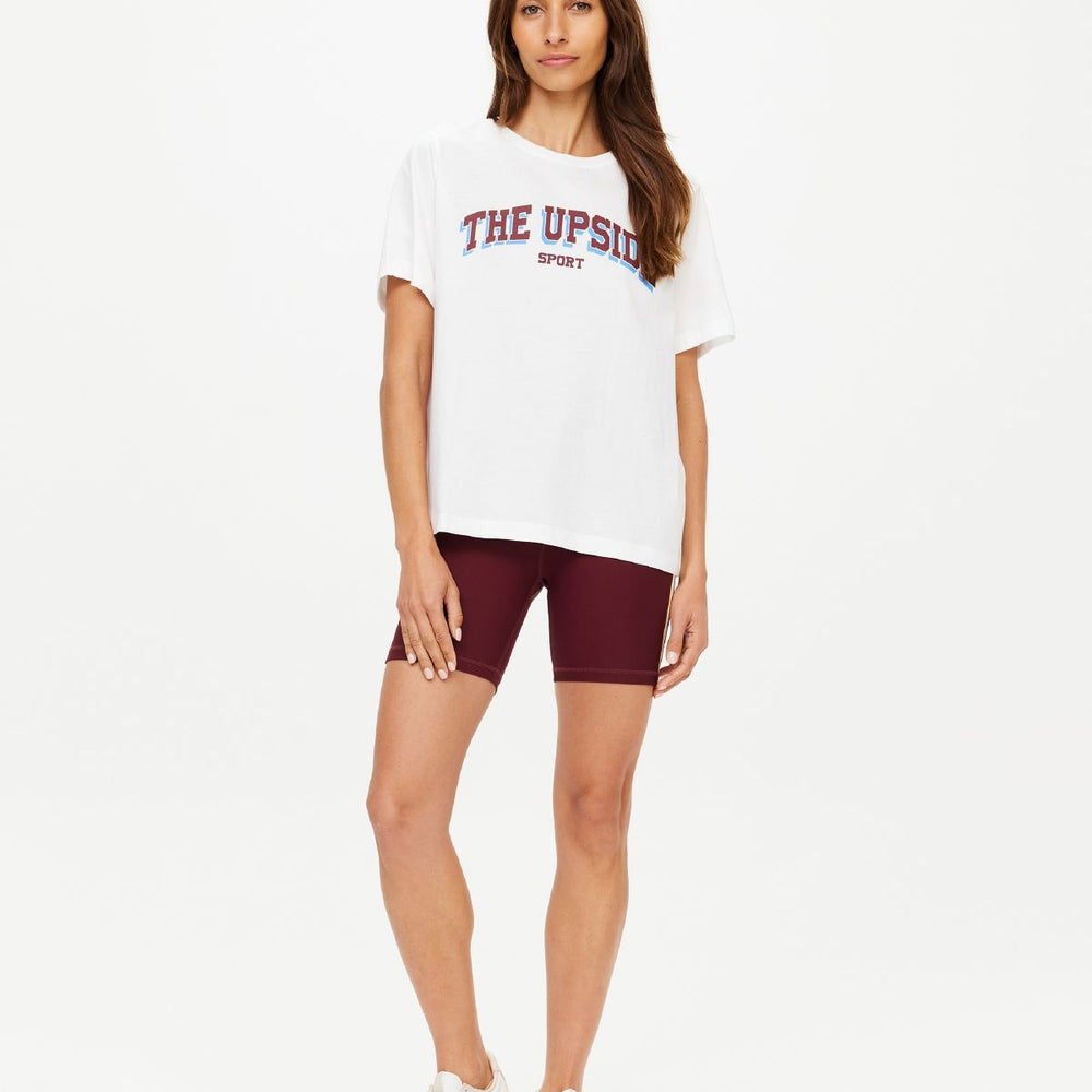 
                      
                        The Upside - Alumni Jodhi Tee in White
                      
                    