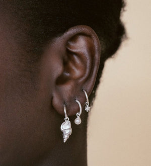 
            
                Load image into Gallery viewer, Kirstin Ash - Tiny Pearl Hoops in Silver
            
        
