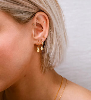
            
                Load image into Gallery viewer, Kirstin Ash - Guiding Star Hoops in Gold
            
        