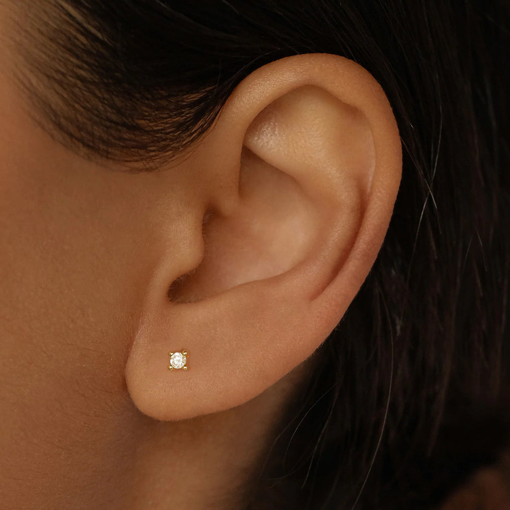 
                      
                        By Charlotte - Pure Light Stud Earrings in Gold
                      
                    